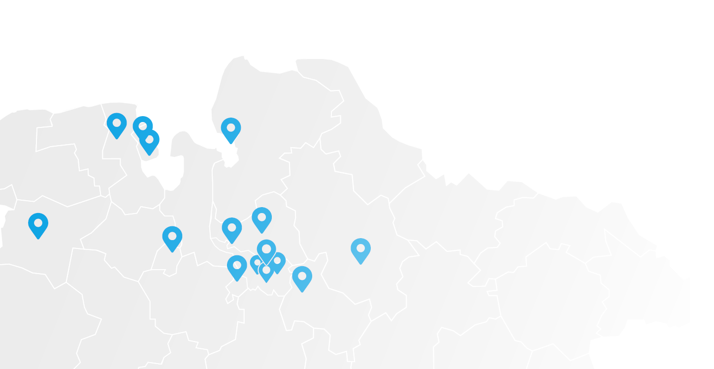 Hellgraue Karte mit Pins, die zeigen, wo die Standorte liegen